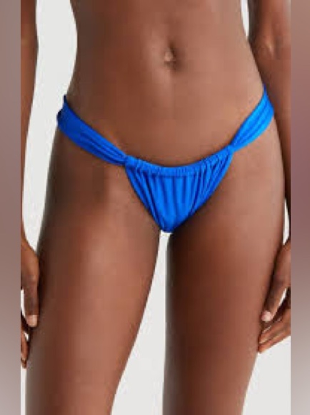KULANI KINIS
Ruched Thong Bikini Bottoms In Malibu Blue